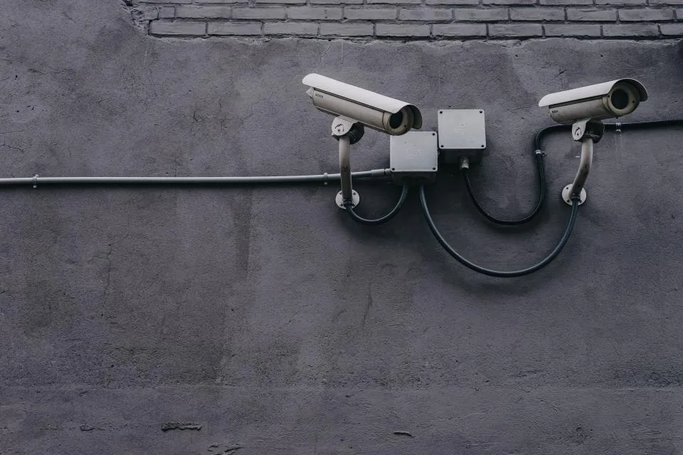 Security cameras mounted on a wall