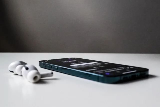 Smartphone lying on a table with a locked screen