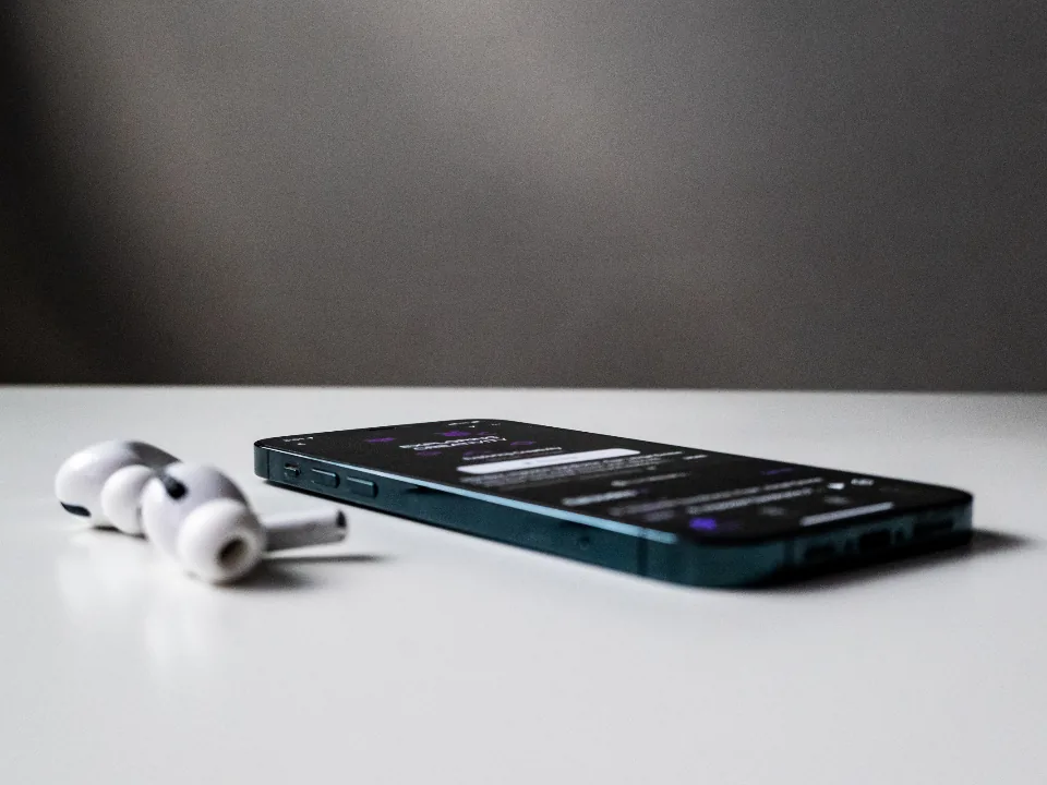 Smartphone lying on a table with a locked screen